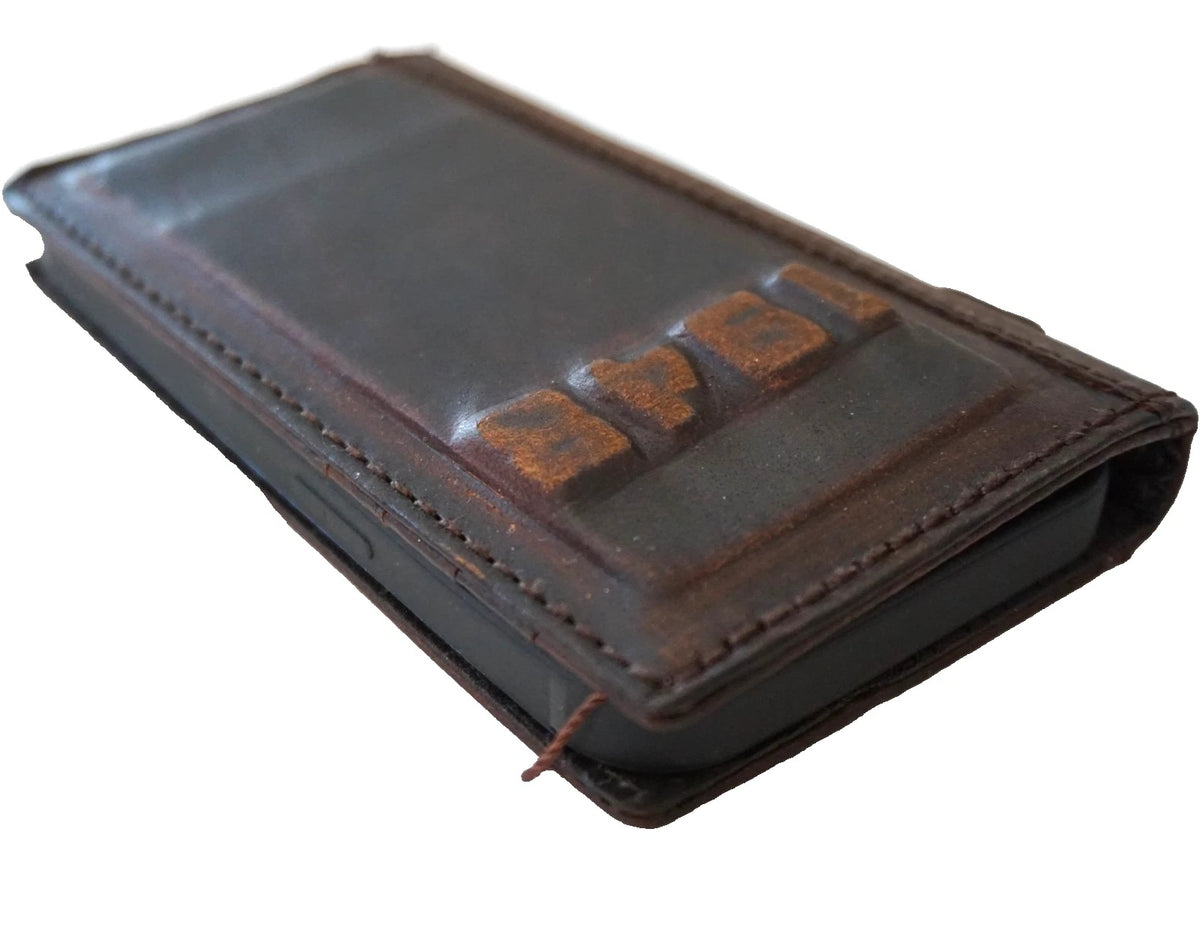 Genuine leather Google Pixel phone case by DAVISCASE, vintage fold wallet style with 3D embossed design for Pixel 7, 8, 9 Pro XL.