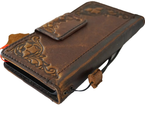 Handcrafted leather phone case with carved corner floral vintage galaxy design by DAVISCASE, showcasing detailed floral artwork.