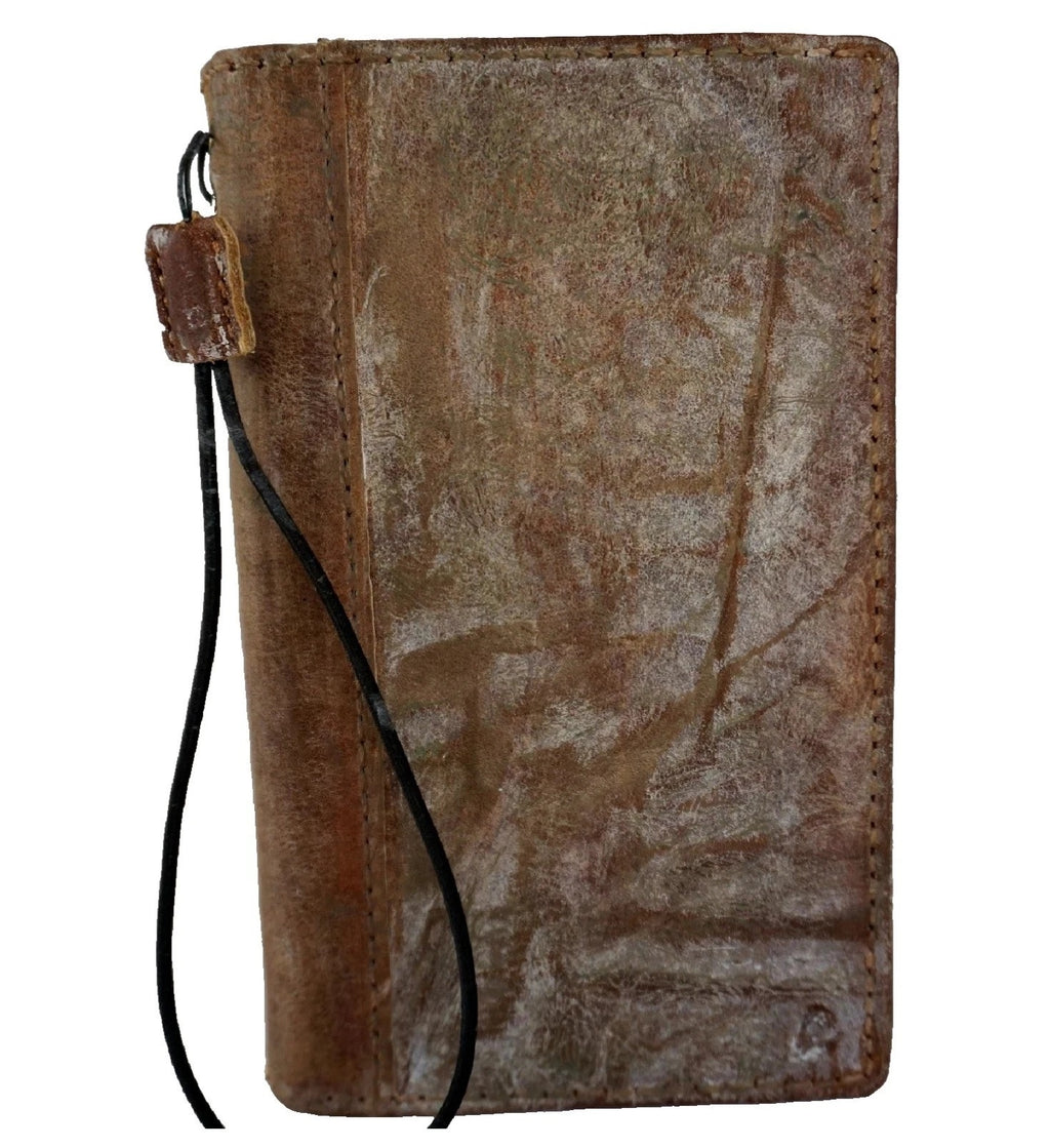 Handmade genuine leather phone case for iPhone 17, 14, 15, 16 Pro Max, and 8 Plus by DAVISCASE, with wallet and sewing details.