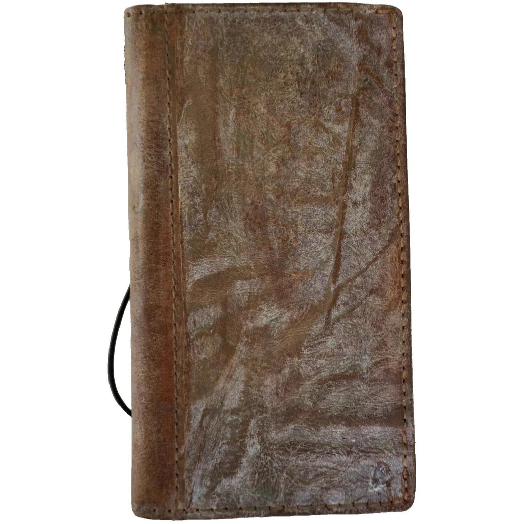Handmade genuine leather phone case for iPhone 17, 14, 15, 16 Pro Max with wallet design by DAVISCASE, showing sewing details.