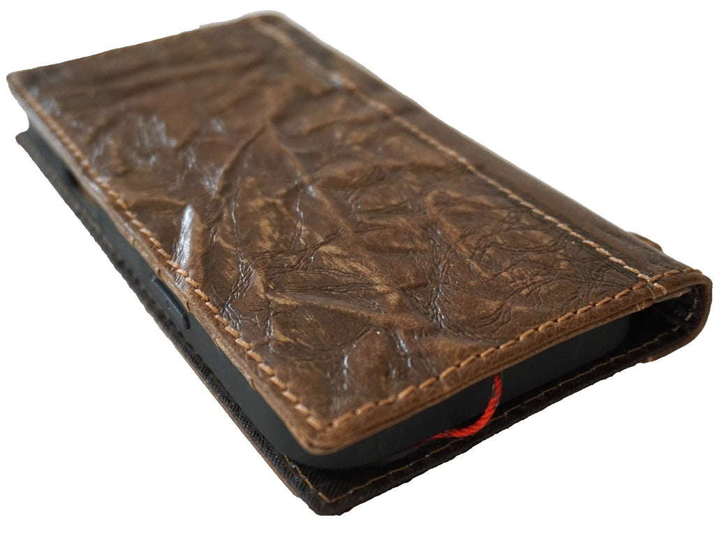 Genuine leather Google Pixel Fold case by DAVISCASE with wallet closure, hand-stitched design, wrinkled texture, and space for a pen.