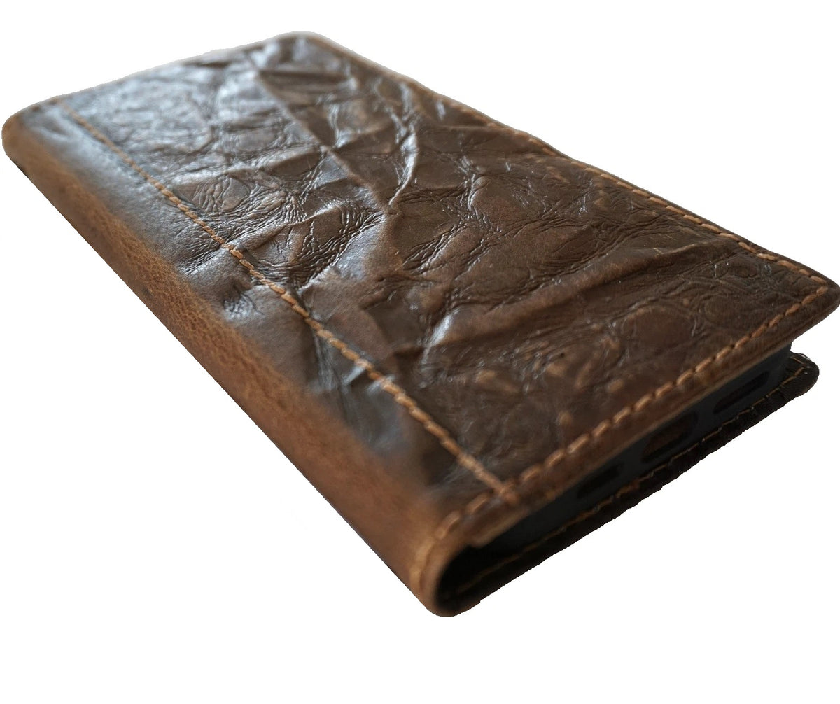 Genuine leather Google Pixel Fold case by DAVISCASE with wallet-style closure, hand-stitched design, and a wrinkled pen holder.