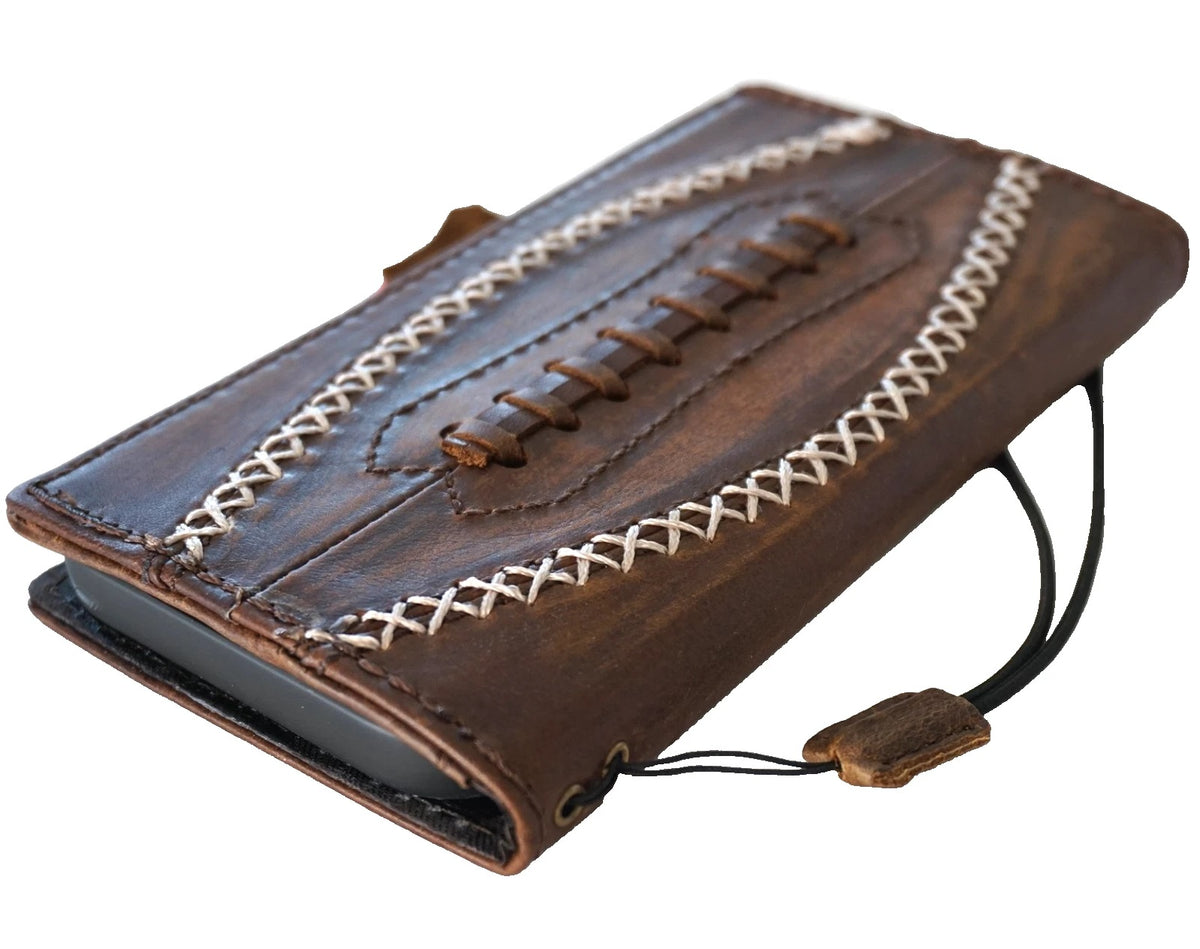 Handmade genuine leather phone case for iPhone 15, 16, 17 Pro Max by DAVISCASE, featuring a mini football design and wallet-style cover.