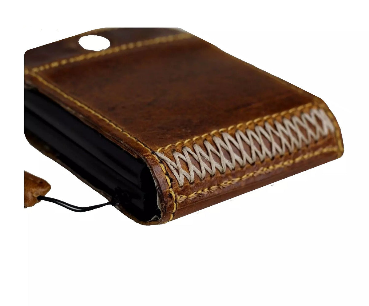 Handmade tan leather wallet case for Galaxy Z Flip series featuring a mini Tree of Life design by DAVISCASE.