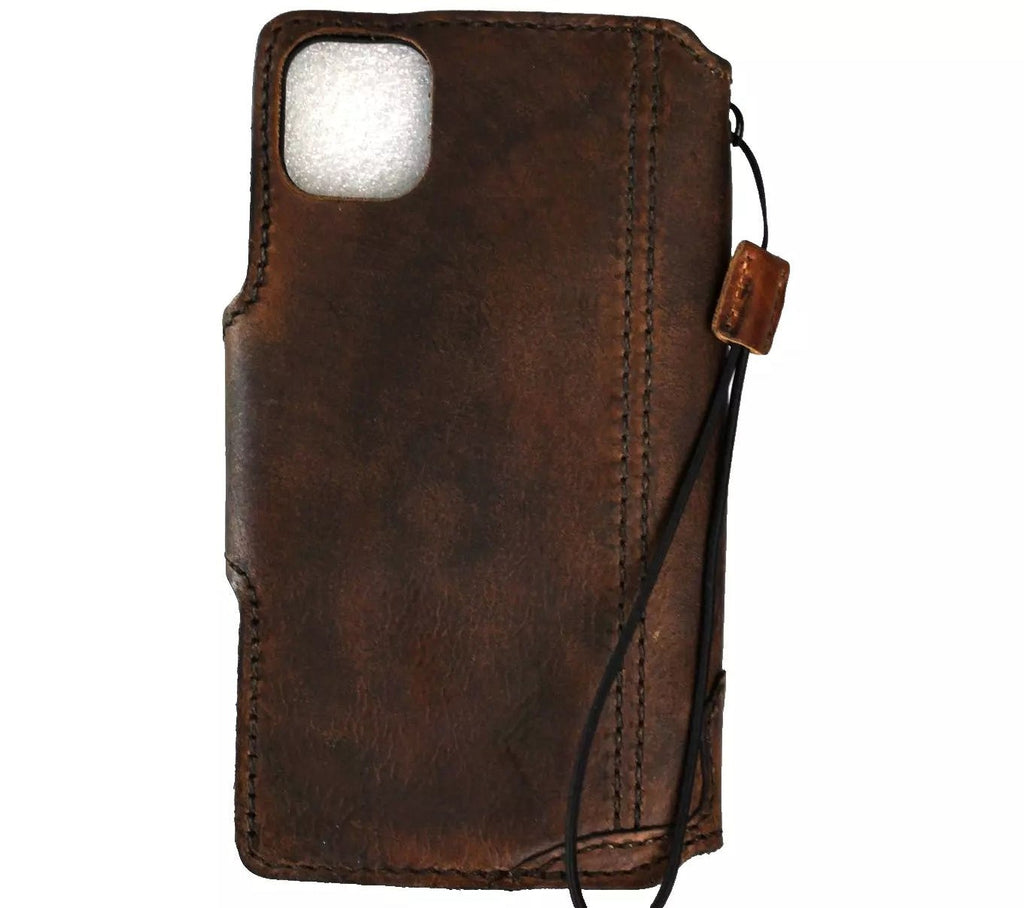 Handmade dark leather phone case for iPhone 14-17 Pro Max with wallet design by DAVISCASE, featuring luxury craftsmanship and minimalist style.