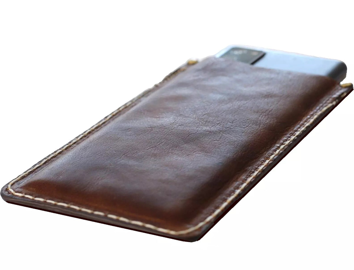 Handmade genuine leather wallet phone case for iPhone 12-16 Pro Max, featuring slim, luxury design with card slots by DAVISCASE.