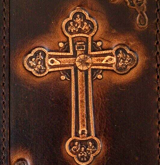 Handmade leather phone case by DAVISCASE for iPhone 11-15 Pro Max, vintage-style cross of Jesus design, full grain oiled leather.