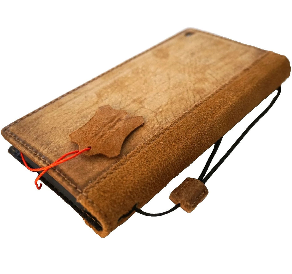 Handmade tan genuine leather wallet case for Apple iPhone 14-17 Pro Max, offering stylish protection and a compact design.