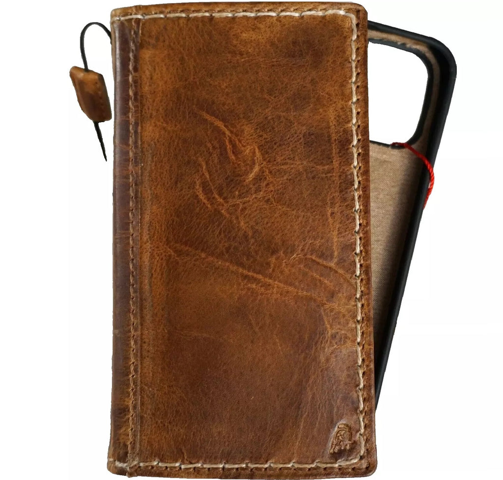 Handmade genuine leather wallet case for iPhone 13 to 16 Pro Max by DAVISCASE, featuring a removable 8 Plus card holder in tan leather.