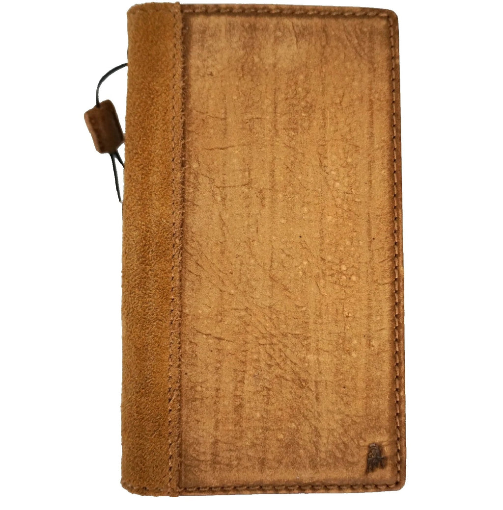 Handmade genuine leather wallet case for iPhone 14 to 17 Pro Max by DAVISCASE, tan color, with a compact, luxurious design.