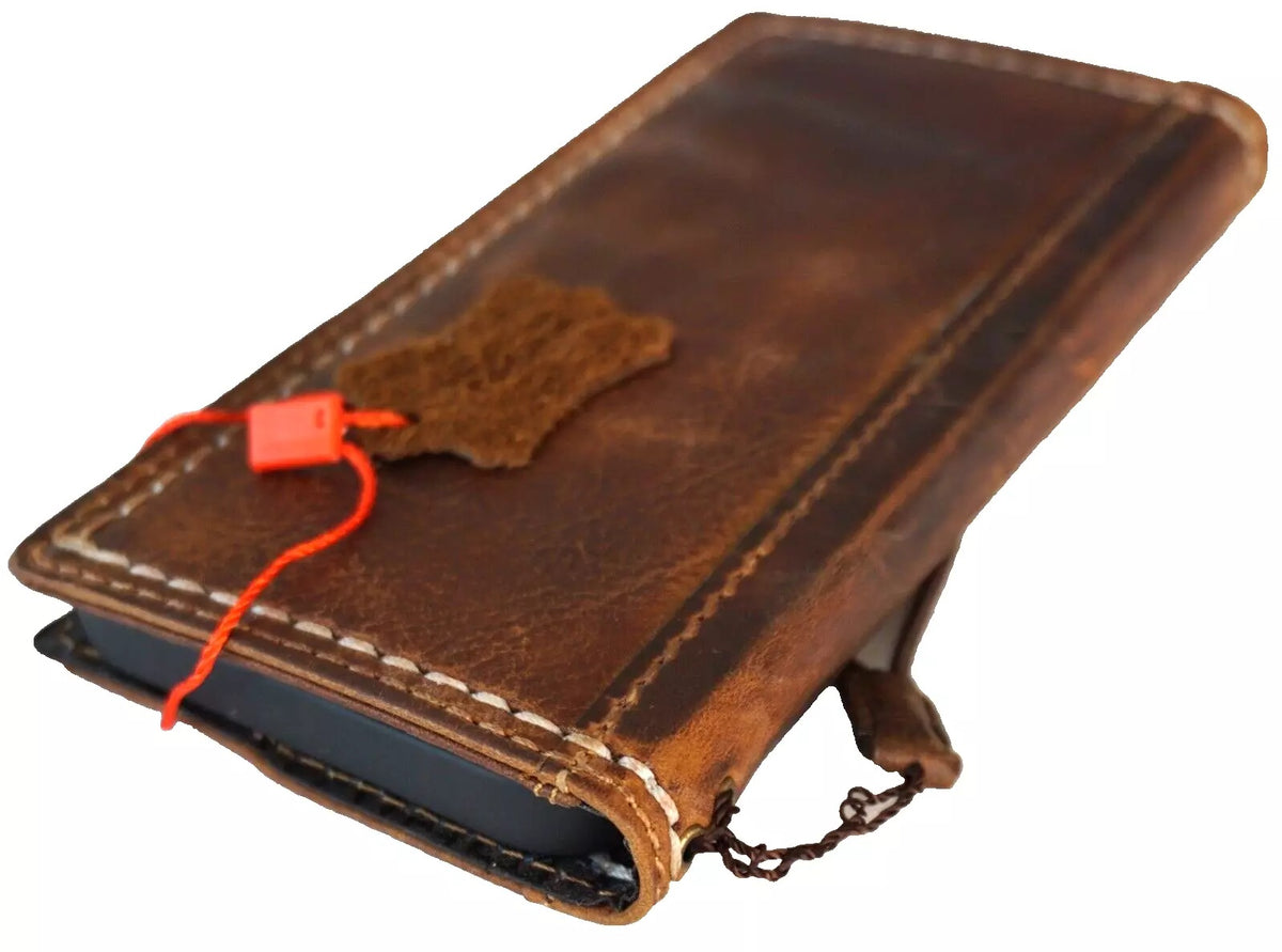 Handmade genuine leather phone case for iPhone 12-16 Pro Max and Plus, featuring a wallet-style book cover by DAVISCASE.