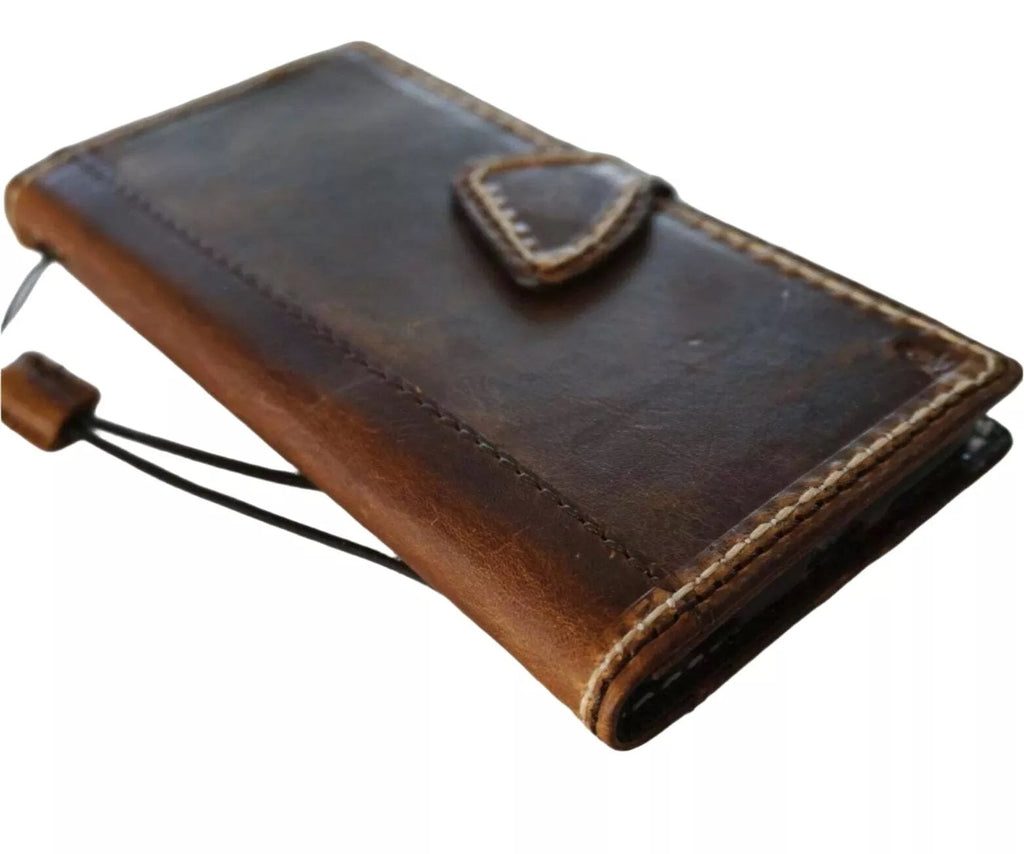 Handmade genuine leather wallet case for Apple iPhone 12, 14, 15, 16, and SE by DAVISCASE, with magnetic closure and sewn hand oil finish.