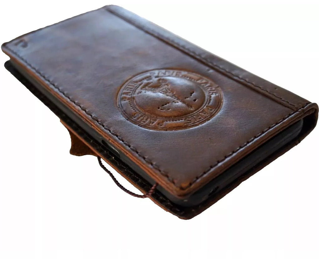 Handmade tan leather phone case for Samsung Galaxy S22, S21, Note 20, A71, A51, and 5G models with wallet and Eiffel Tower design.