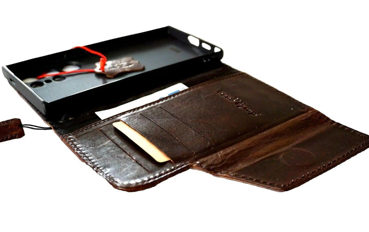 Handmade dark brown genuine leather Samsung Galaxy S24 Ultra case with magnetic closure, rubber holder, and wireless charging compatibility.