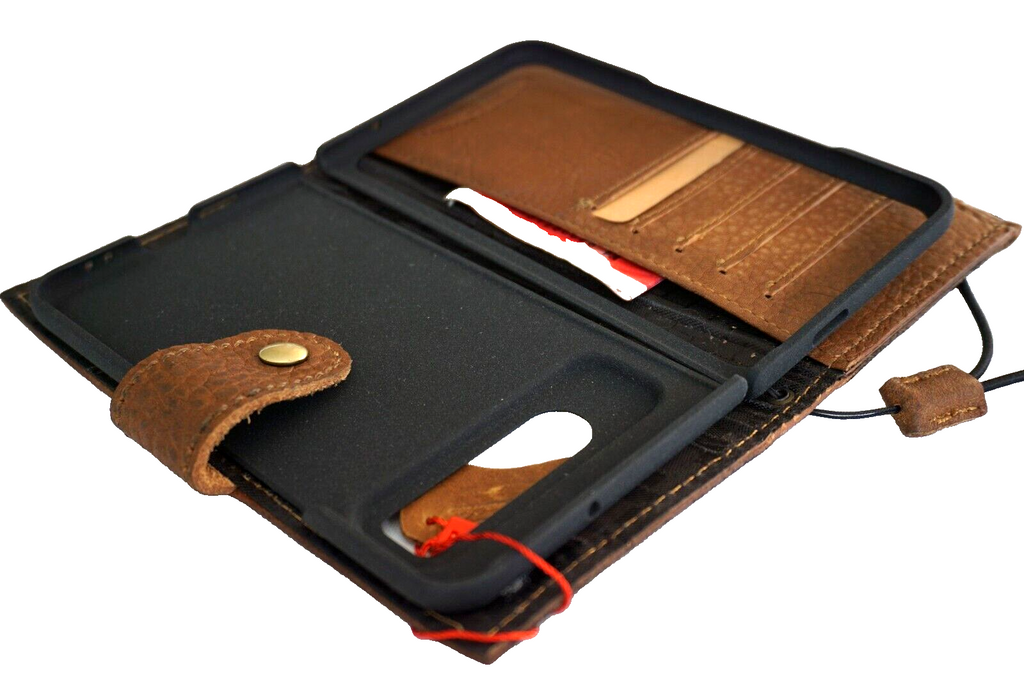 Genuine leather Google Pixel Fold case by DAVISCASE with wallet design, stand feature, zip closure, and wireless charging compatibility.