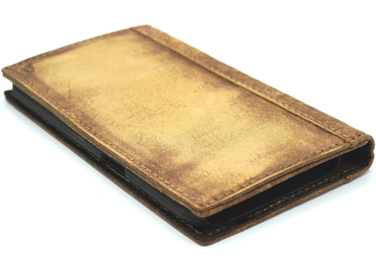Handmade genuine leather phone case for iPhone models, vintage style wallet cover with art tan finish and mini craft details.