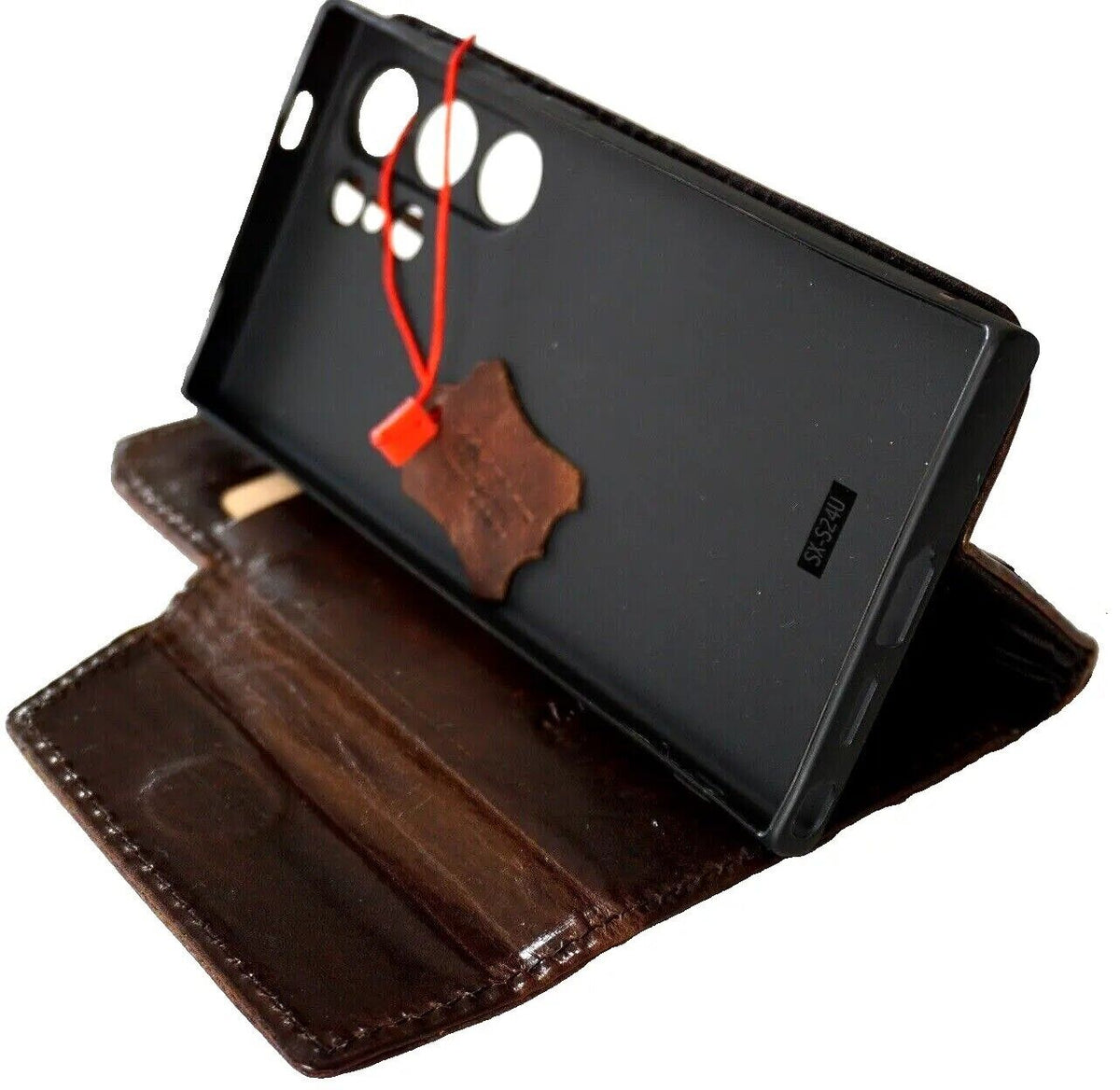 Dark brown genuine leather case for Samsung Galaxy S24 Ultra by DAVISCASE, handmade with magnetic closure and rubber holder.