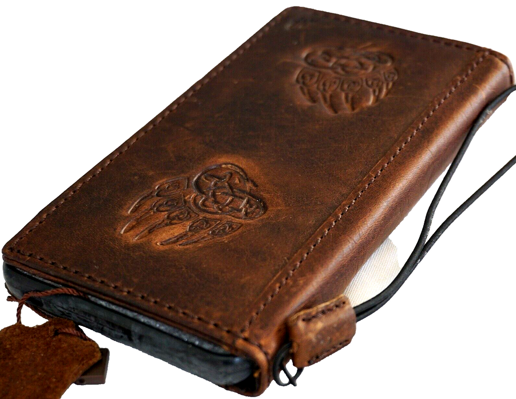 Handcrafted genuine leather wallet phone case for iPhone 11-15 Pro Max with vintage bear paw design and card slots, luxury full grain leather.