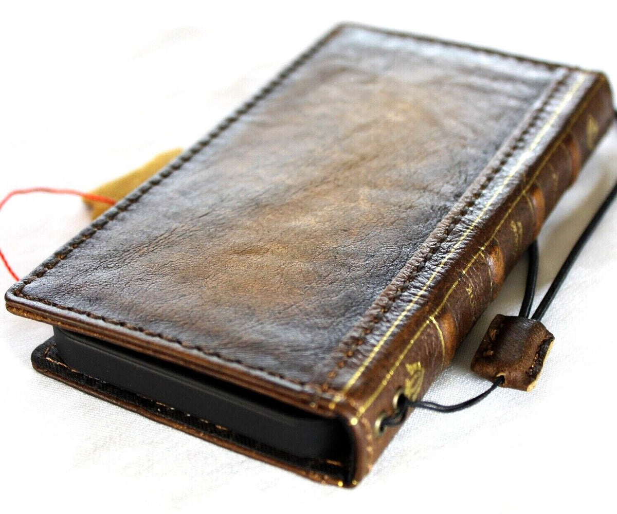 Handmade genuine leather phone case for iPhone 12-16 Pro Max, SE, and 8 Plus by DAVISCASE, featuring a Bible craft design and wallet style.