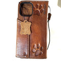 Handmade genuine leather phone case for iPhone 11-16 Pro Max, with magnetic dog paw design and wallet features by DAVISCASE.