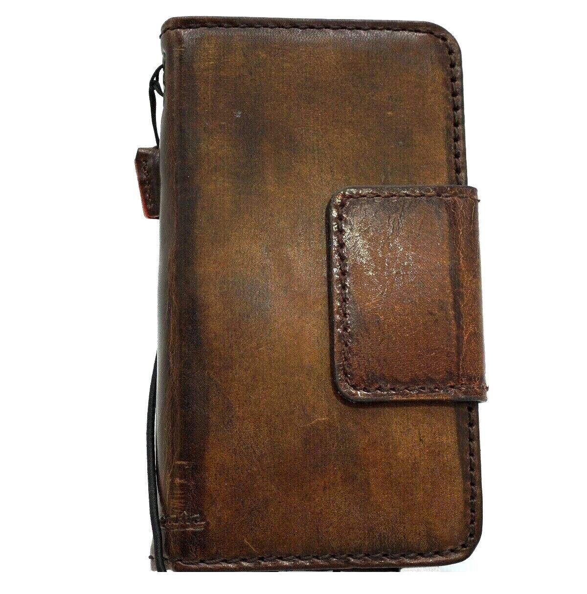 Handmade genuine leather phone case for Samsung Galaxy S series, with wallet and magnetic closure, in a sleek, polished finish.