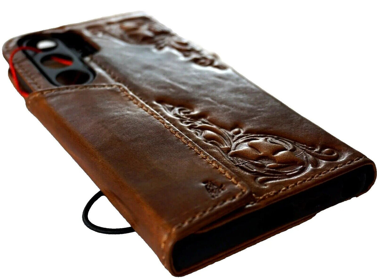 Handmade genuine leather Samsung Galaxy S24/S25/S26 Ultra wallet case with magnetic closure and rubber holder, tan color.