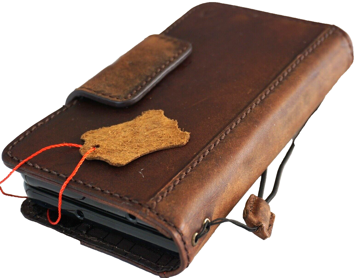 Genuine leather Google Pixel Fold case by DAVISCASE with wallet-style design, stand feature, and wireless charging compatibility.