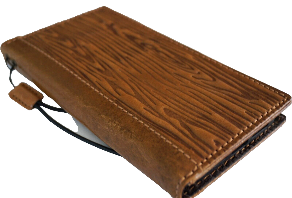 DavisCase genuine leather phone case for iPhone models with vintage tan woodcraft design, credit card slots, and full grain leather finish.