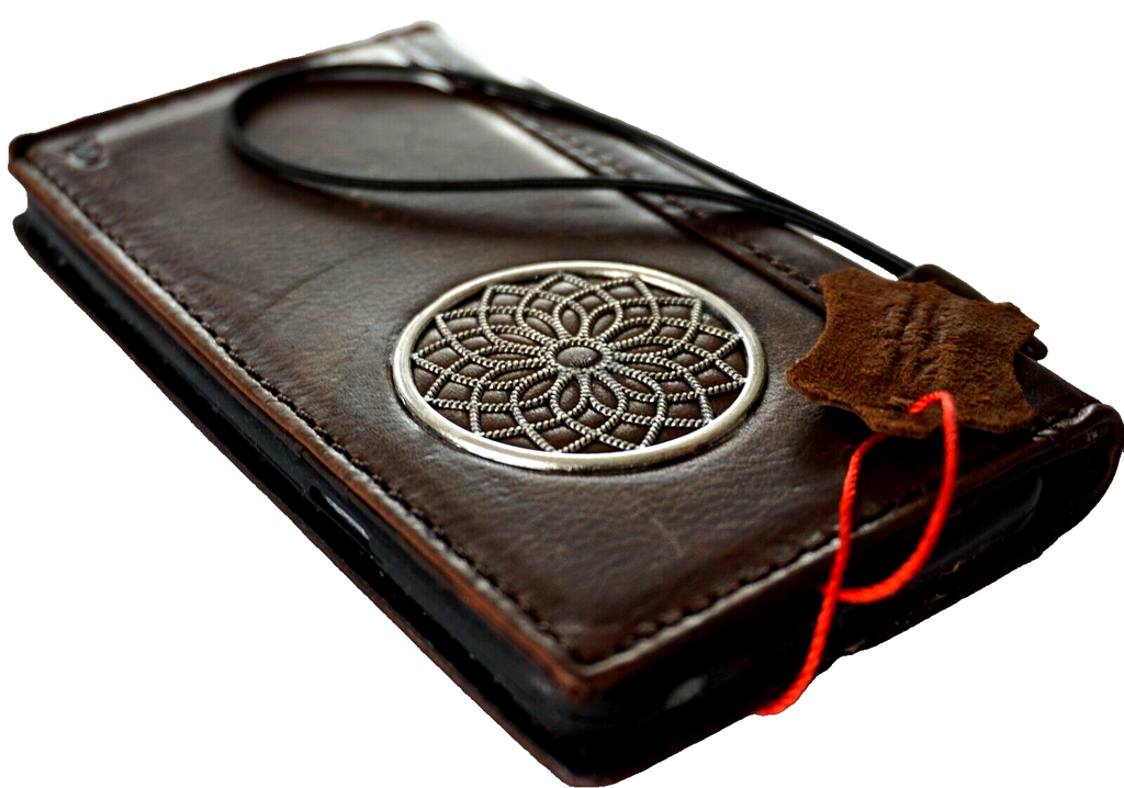 Handmade genuine leather phone case by DAVISCASE for Samsung Galaxy S and A series, vintage style wallet cover with mini adornments.