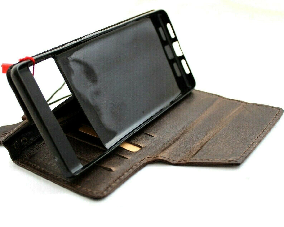 Genuine leather Google Pixel 7 Pro case by DAVISCASE featuring Tree of Life design, magnetic closure, wallet style, and stand function.