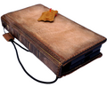 Handmade genuine leather phone case by DAVISCASE for Galaxy S24, S25, S26 Ultra with wallet and vintage Bible book design.