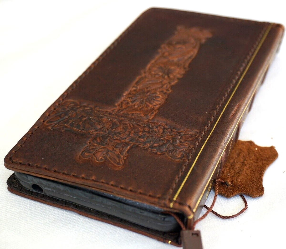 Handmade genuine leather phone case for iPhone 12-16 Pro Max, featuring a DIY Cross of Jesus design and Bible book style cover.