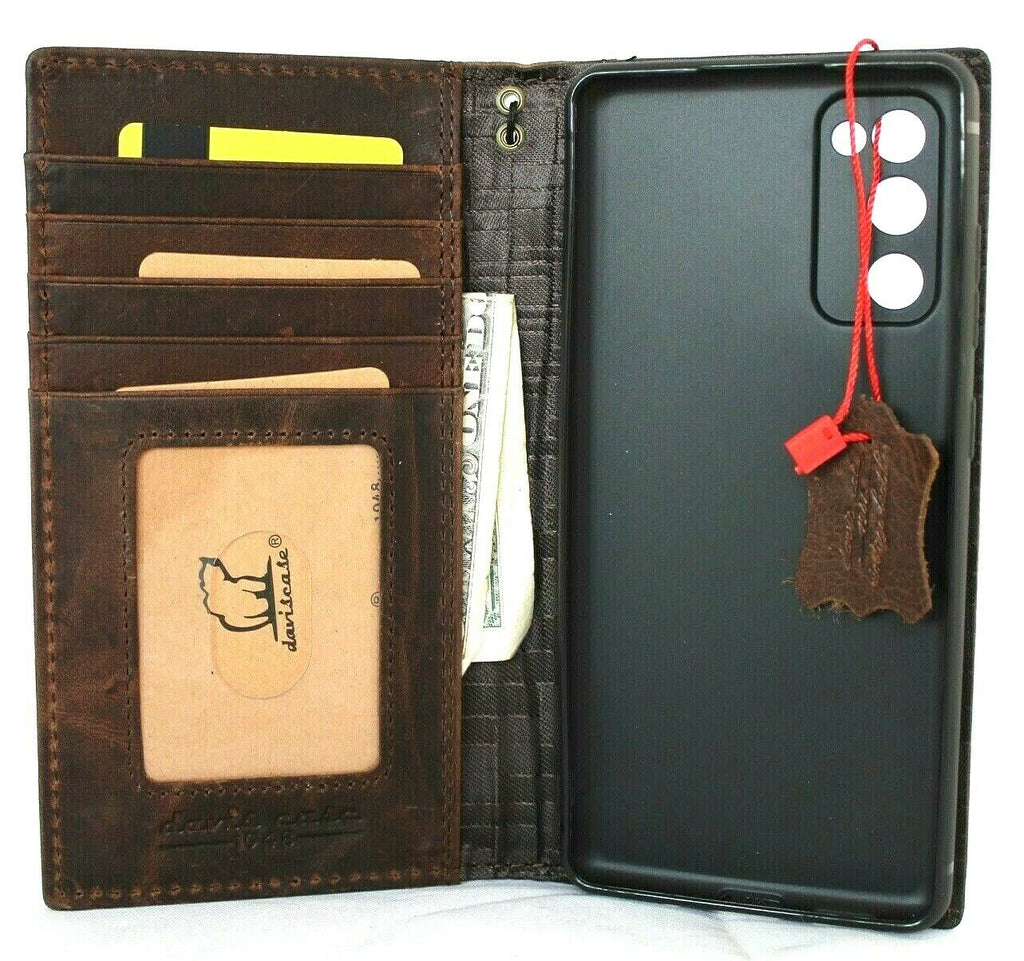 Nokia C32 leather phone case by DAVISCASE with card slots, slim soft rubber design, and wireless charging holder in genuine leather.