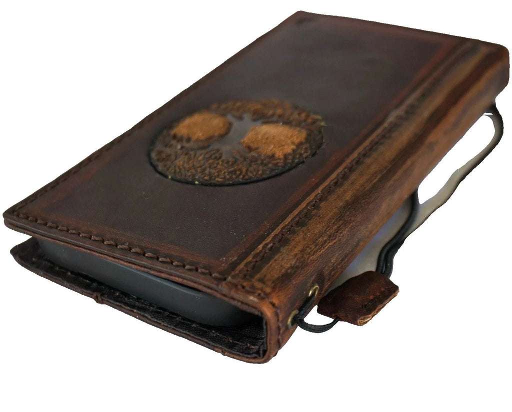Genuine leather Google Pixel wallet case by DAVISCASE with Tree of Life design, fold cover, and handmade luxury craftsmanship.