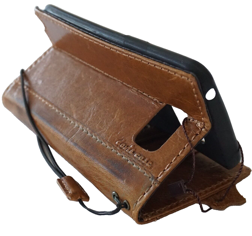 Handmade genuine leather phone case for iPhone 11 to 15 Pro Max by DAVISCASE, in smoked tan with shark design and wallet features.