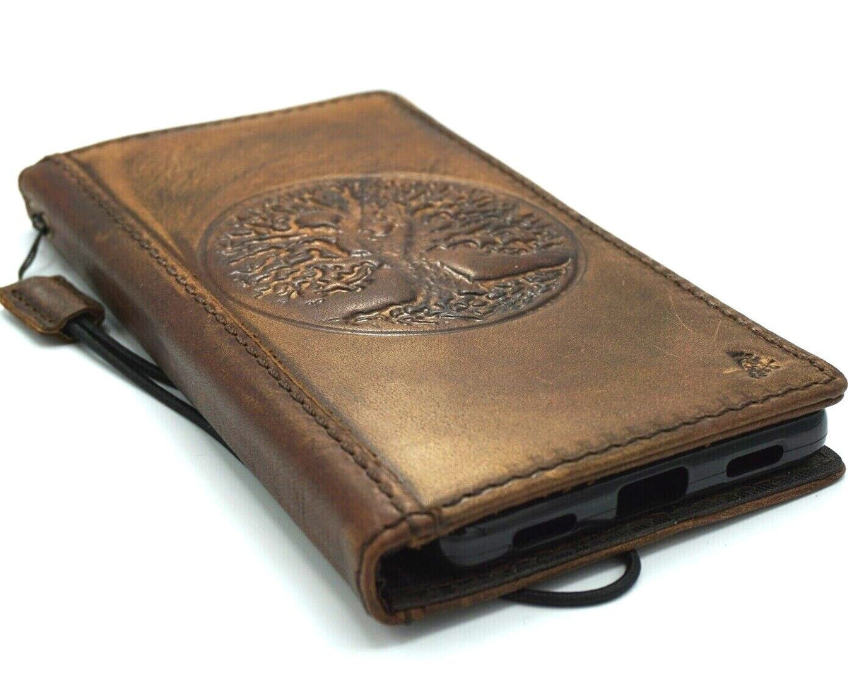 Handmade leather phone case for Galaxy S series and Note models with vintage Tree of Life Stone design, full grain leather, and wallet features.