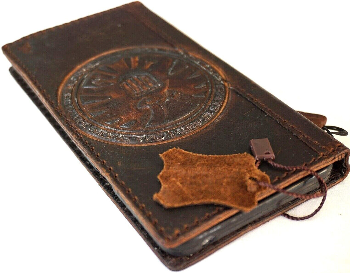 Daviscase genuine leather wallet case for Google Pixel 6, 7, 8, 9 Pro XL, 8a with German cross design and wireless charging feature.