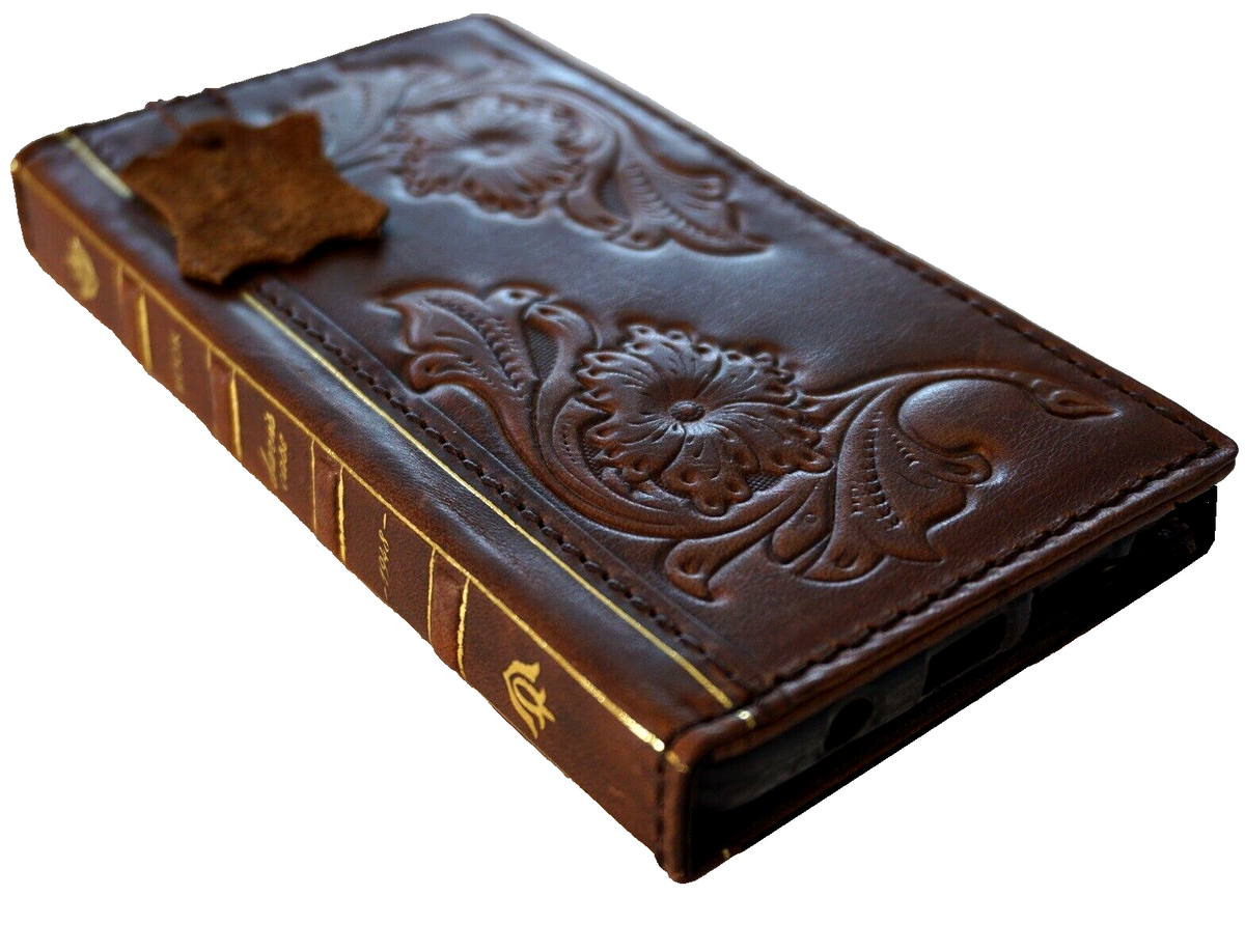 Handmade DAVISCASE genuine leather phone case for iPhone models with wallet and Bible art design in tan color.
