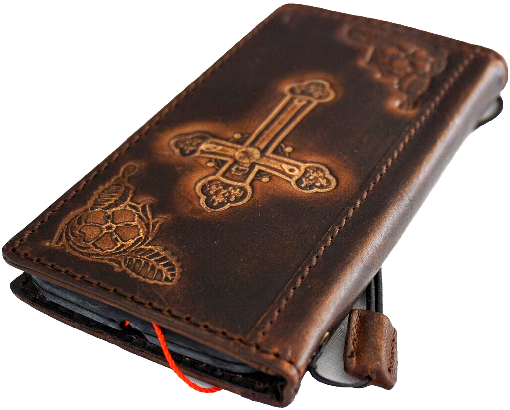 Genuine leather case for Google Pixel phones by DAVISCASE, featuring a Jesus cross design and wallet-style cover.