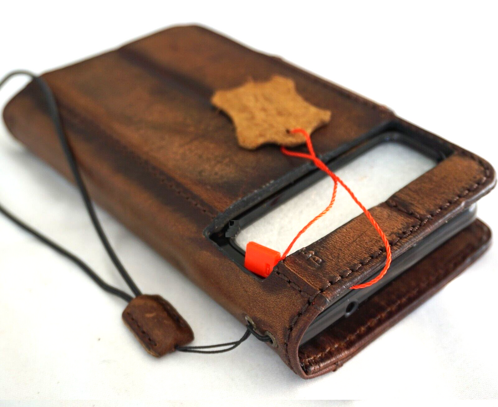 Genuine leather Google Pixel Fold case by DAVISCASE with wallet design, stand feature, and wireless charging compatibility.