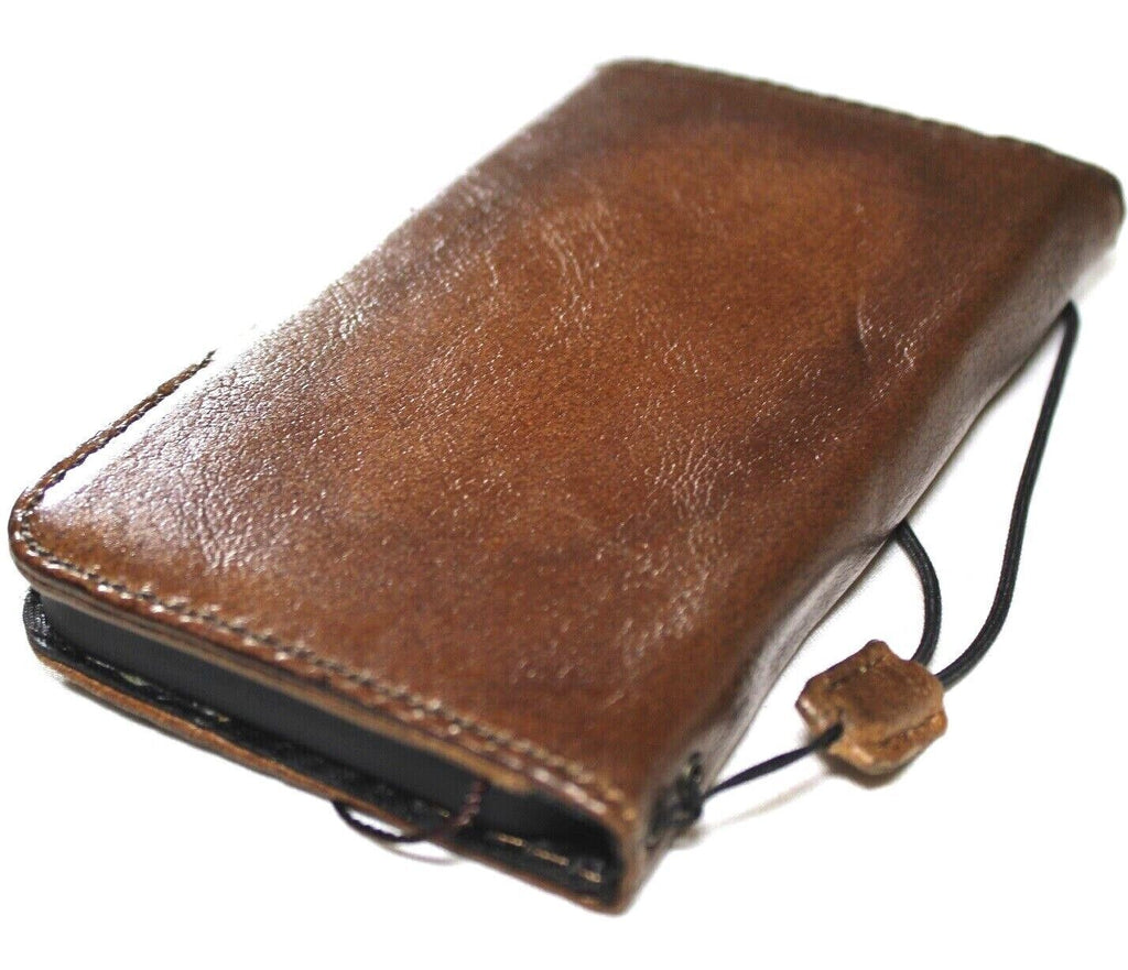 Handmade genuine leather phone case for Apple iPhone 11-16 Pro Max with magnetic dog paw design and wallet features by DAVISCASE