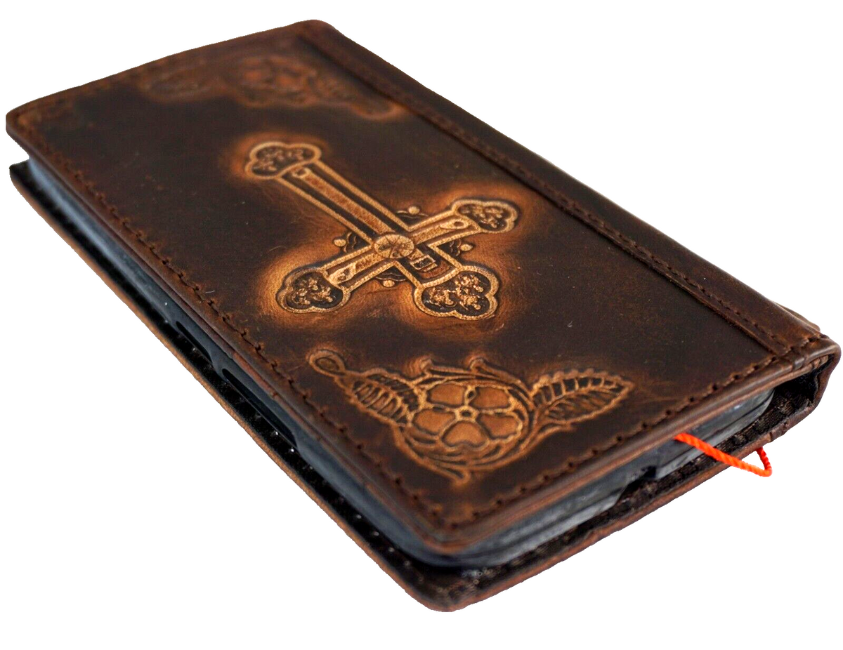Genuine leather Google Pixel phone case by DAVISCASE featuring a Jesus cross design in black and brown tones.