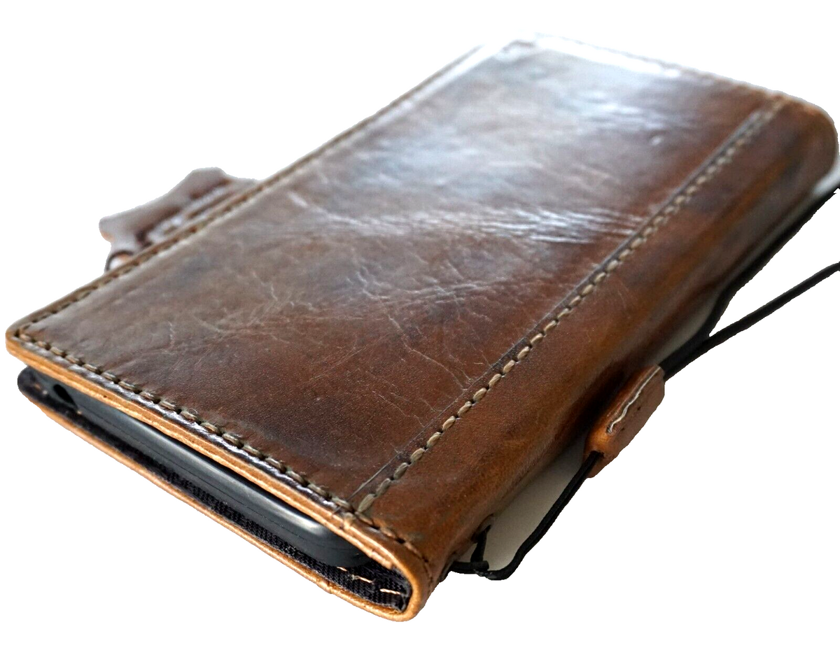 Genuine leather Google Pixel 7 Pro case by DAVISCASE with retro book wallet design, stand feature, and rustic oiled tan finish.