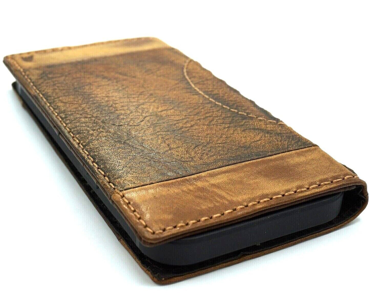 Handmade leather phone case for iPhone and Samsung, vintage style with card slots, full grain leather, and intricate craft details.