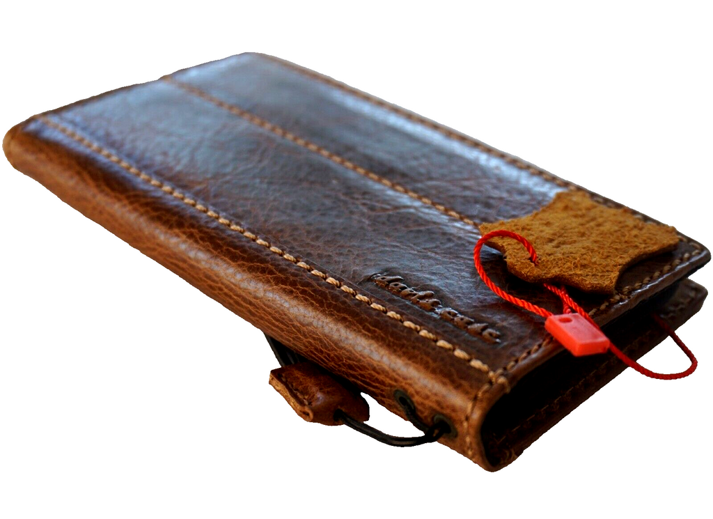 Handmade genuine leather phone case for iPhone models, featuring a luxury book cover design with wallet and mini art details by DAVISCASE.