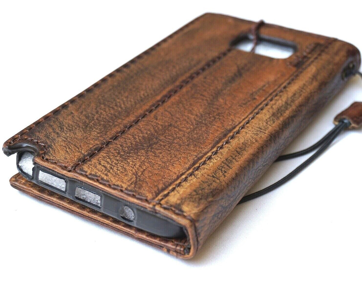 Handmade genuine leather phone case for iPhone models, vintage style wallet cover with DIY craft details by DAVISCASE.