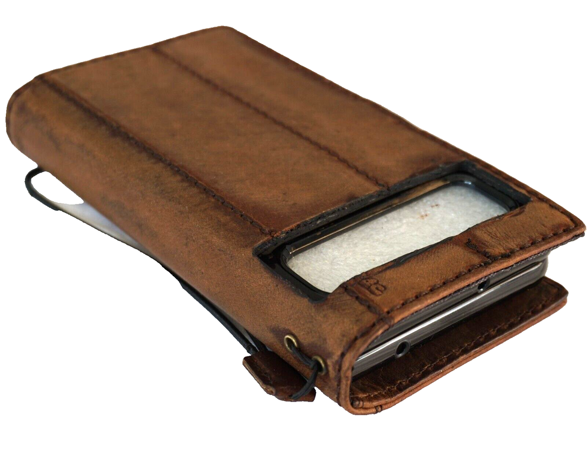 Genuine leather Google Pixel Fold case by DAVISCASE with book-style wallet closure, stand feature, wireless charging compatibility.