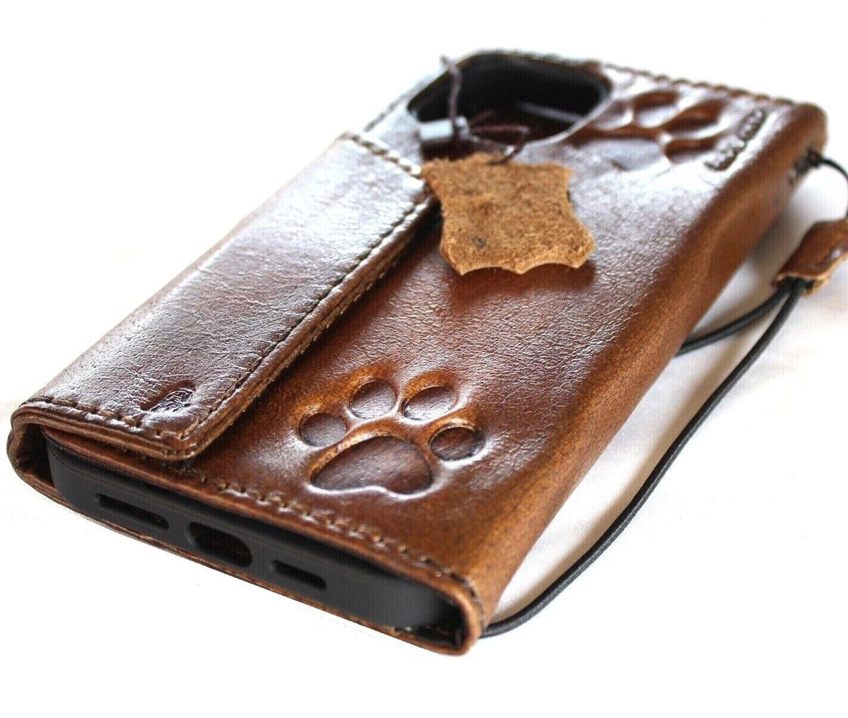 Handmade DAVISCASE genuine leather phone case with magnetic dog paw design for iPhone 11-16 Pro Max, wallet book style.
