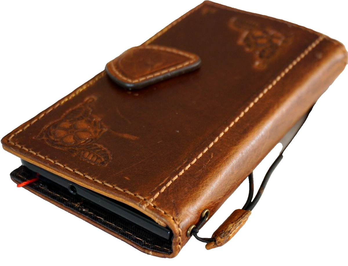 Genuine leather Google Pixel Fold case by DAVISCASE in tan, featuring wallet design, stand function, and wireless charging compatibility.