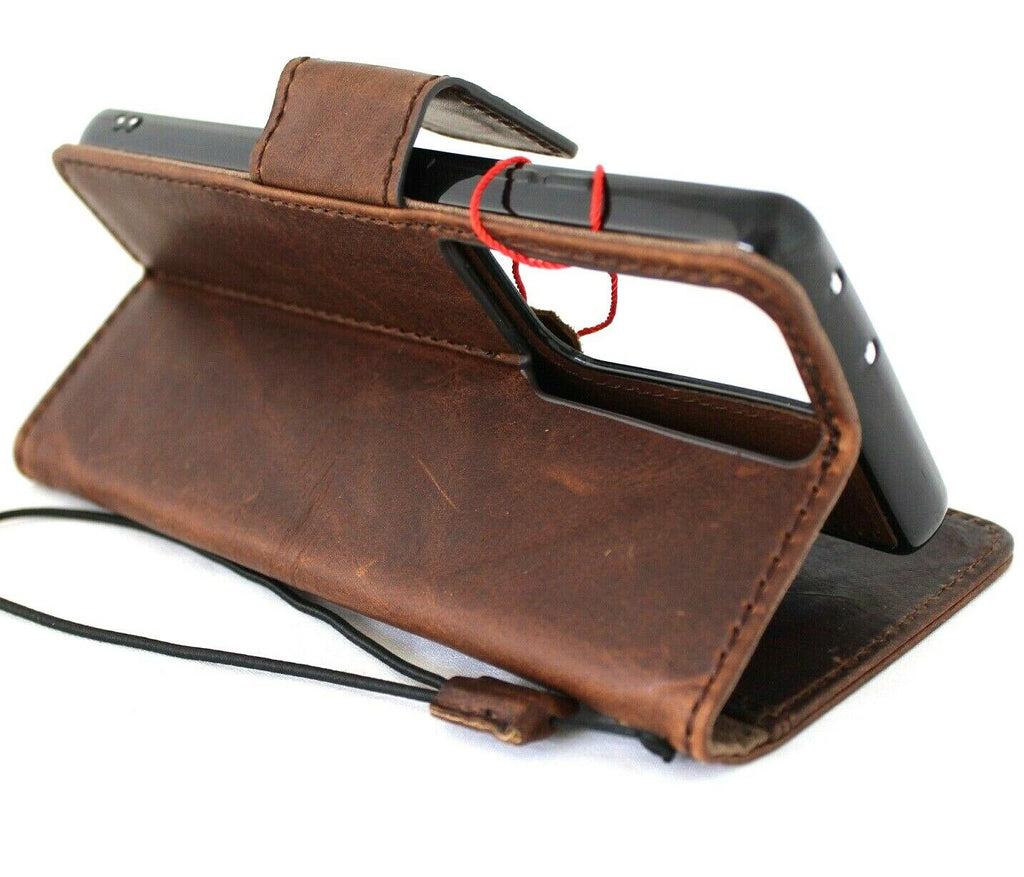 Handmade genuine leather phone case by DAVISCASE for Galaxy S22, S21, S20, S23, S24, S25 Ultra, with magnetic wallet feature.